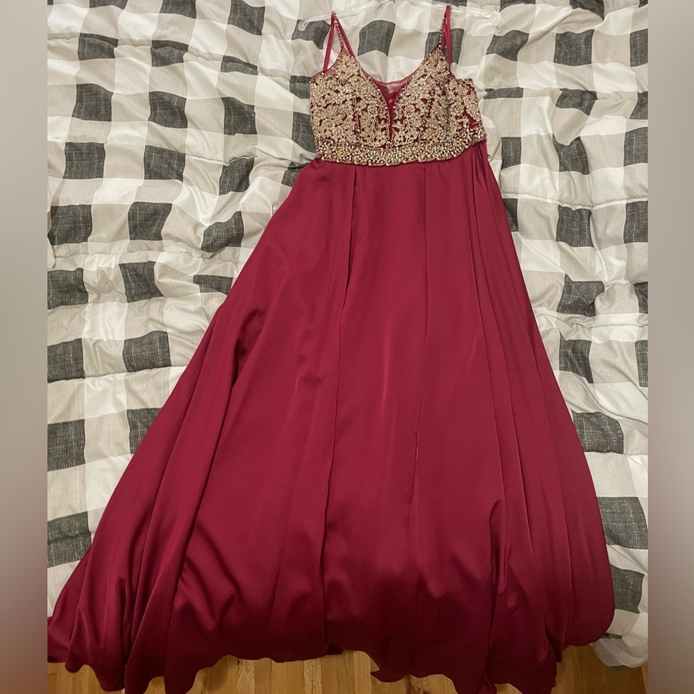Elegant Red Gown with Gold Embellishments